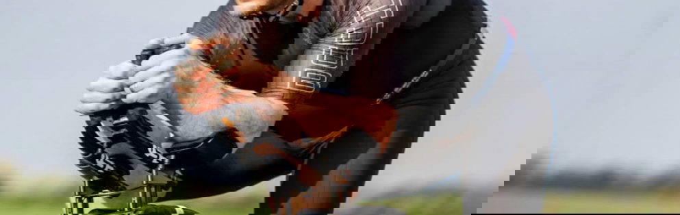 SF Planning Sponsors Local Triathlete. A photograph of a male trathlete, ben Bowers, riding his competition bike.